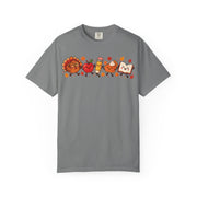 Thanksgiving teacher shirt for women with a turkey, apple, pencil, pie and book design