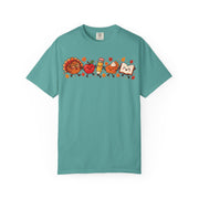 Thanksgiving teacher shirt for men with a turkey, apple, pencil, pie and book design