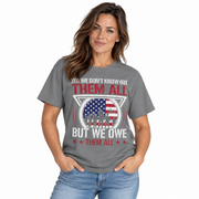 We Don't Know Them All, But We Owe Them All print on a garment-dyed women's shirt