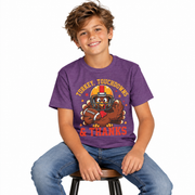 Boy wearing the kids Thanksgiving football turkey shirt