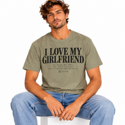 Man wearing the I Love My Girlfriend checklist shirt in a studio portrait