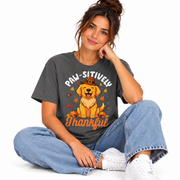 Woman wearing the Paw-sitively Thankful dog Thanksgiving shirt