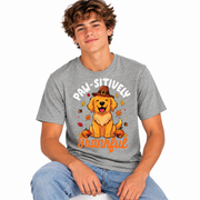 Paw-sitively Thankful dog design on a kids Thanksgiving shirt