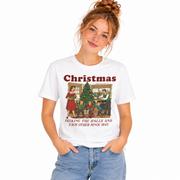 Women's Decking the Halls vintage Christmas shirt with a retro family holiday scene, flat lay