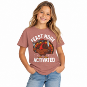 Child wearing the Feast Mode Activated Thanksgiving shirt