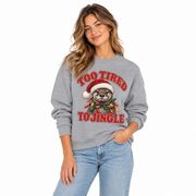 Woman wearing the Too Tired to Jingle otter Christmas crewneck