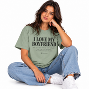 Model wearing the green I Love My Boyfriend shirt with the printed checklist