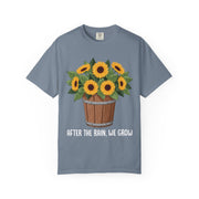 Bucket of sunflowers with After the Rain, We Grow underneath, on a blue jean shirt