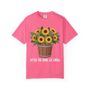 Bucket of sunflowers with After the Rain, We Grow underneath, on a crunchberry shirt