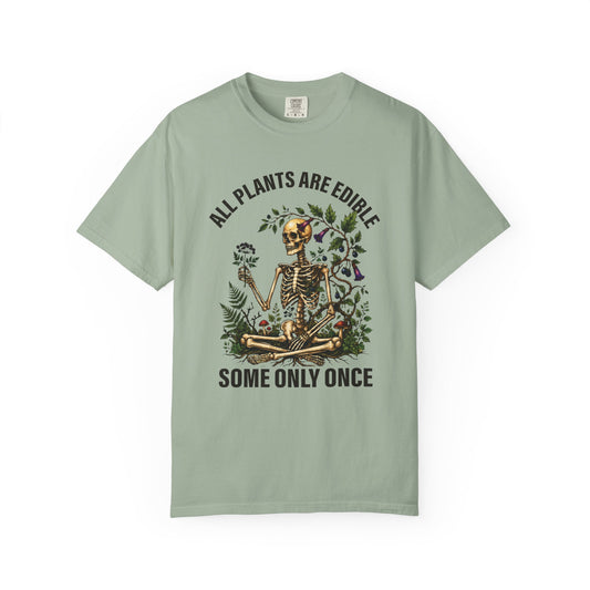 Botanical skeleton with All Plants Are Edible Some Only Once, on a bay green women's shirt