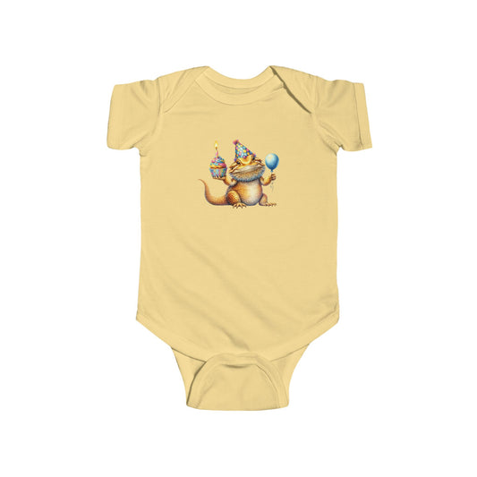 Bearded dragon in a party hat with a cupcake and balloon, on a butter yellow baby bodysuit