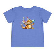 Bearded dragon in a party hat with a cupcake and balloon, on a heather columbia blue toddler shirt