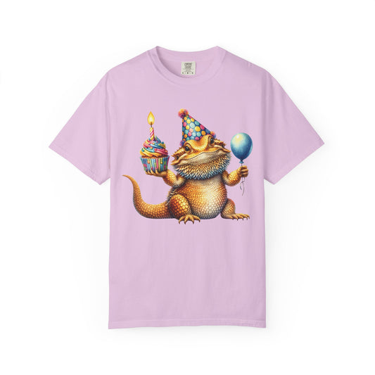 Bearded dragon in a party hat with a cupcake and balloon, on an orchid women's shirt