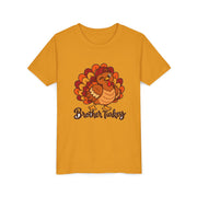 Brother Turkey matching Thanksgiving design on a mustard kids shirt