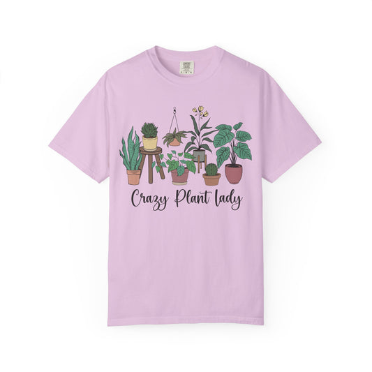 Drawn houseplants with Crazy Plant Lady in script underneath, on an orchid purple shirt