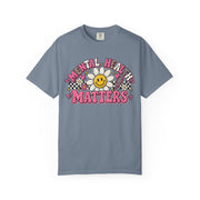 Mental Health Matters with a smiling daisy and pink checkerboard, on a blue jean shirt