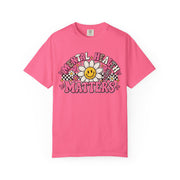 Mental Health Matters with a smiling daisy and pink checkerboard, on a crunchberry shirt