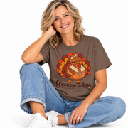 Woman wearing the Grandma Turkey matching Thanksgiving shirt