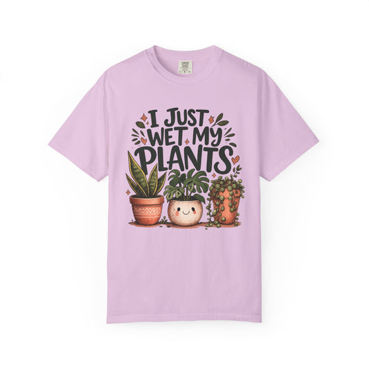 Three potted plants with I Just Wet My Plants in hand lettering, on an orchid shirt