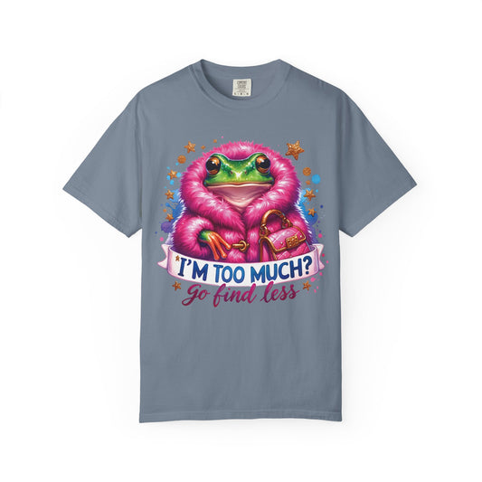 Frog in a pink fur coat with a handbag and the line I'm too much? Go find less, on a blue jean shirt