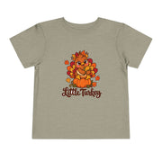 Little Turkey matching Thanksgiving design on a toddler shirt