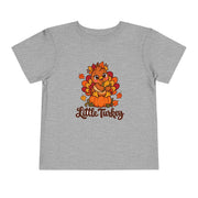 Little Turkey matching Thanksgiving design on a toddler shirt