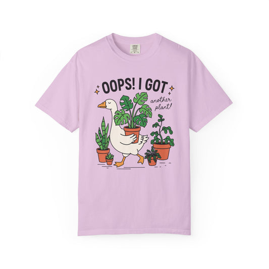 Goose carrying a potted monstera with Oops I Got Another Plant, on an orchid shirt
