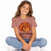 Girl wearing the Sister Turkey matching Thanksgiving shirt