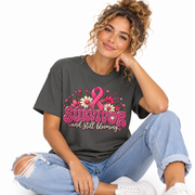Survivor And Still Blooming breast cancer survivor shirt for women, worn