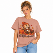 Woman wearing the Thankful And Caffeinated otter Thanksgiving shirt