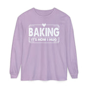 Baking It's How I Hug chest print on an orchid purple women's long sleeve shirt