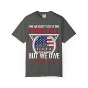 We Don't Know Them All, But We Owe Them All chest print on a pepper grey women's shirt